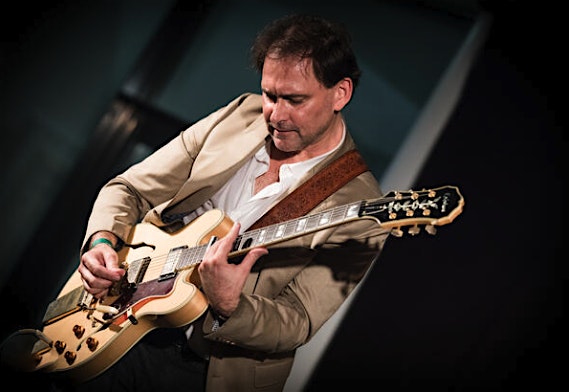 Blues Guitarist Johnny Burgin performing live.