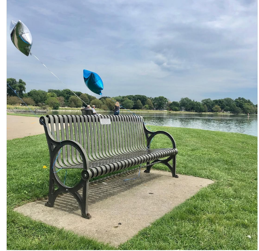 Bench Dedicated to Clyde Stubblefield overlooking Monona Bay, Brittingham Park, Madison. Photo Courtesy of WMTV15.